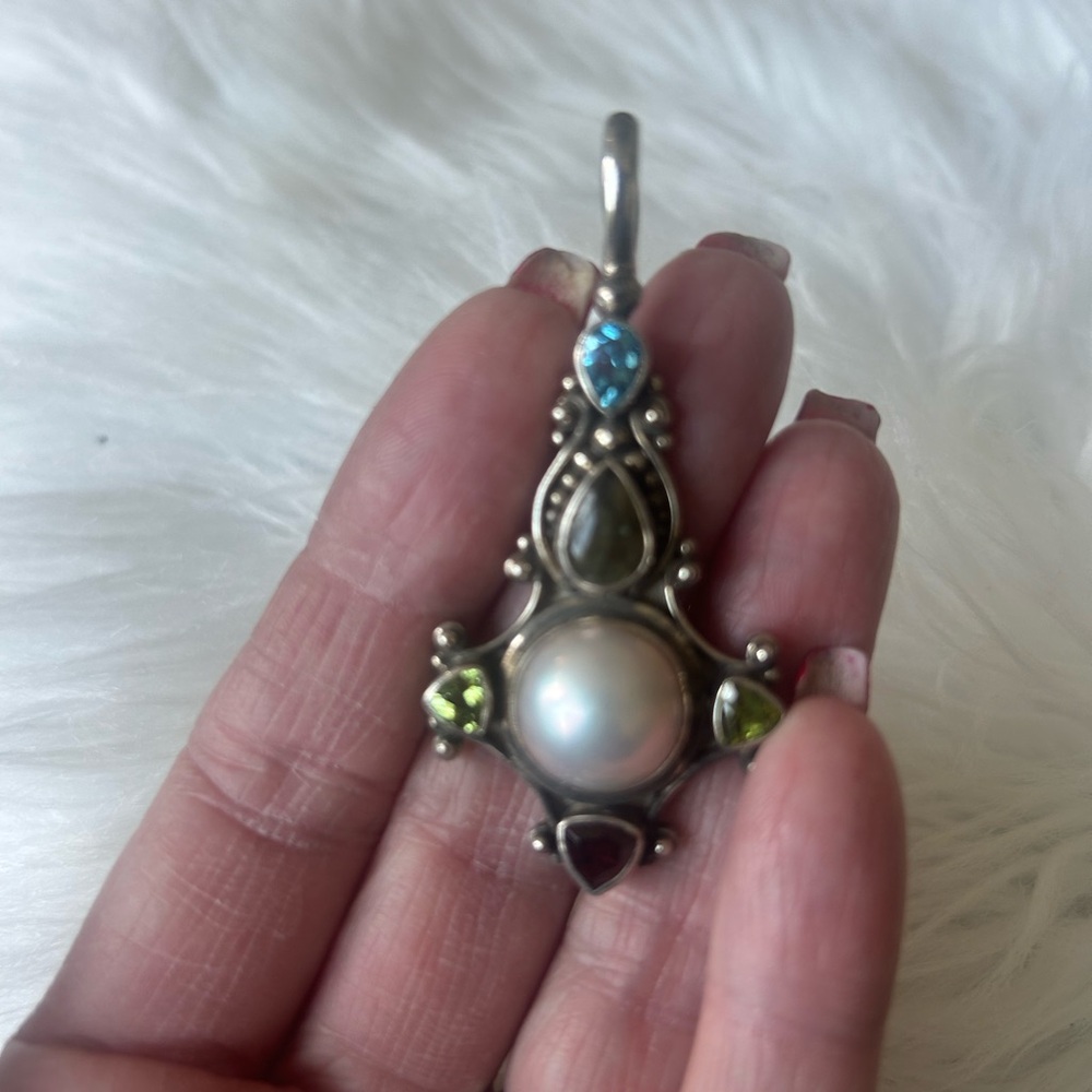 Silver and Blue Necklace with Intricate Pendant